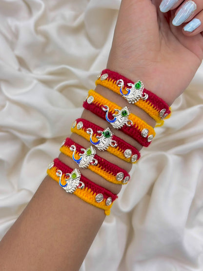 Premium Peacock Feather Om Silver Rakhi