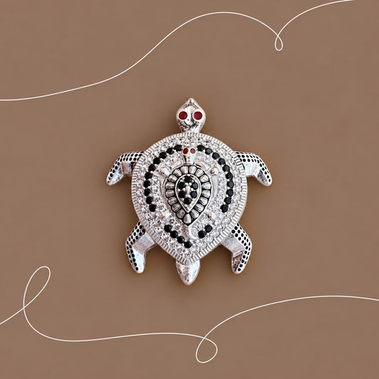 Silver Tortoise with Ruby Detailing